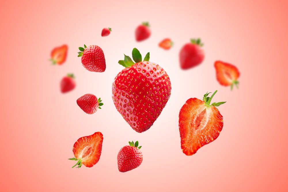 free-photo-strawberry-berry-levitating-red-background